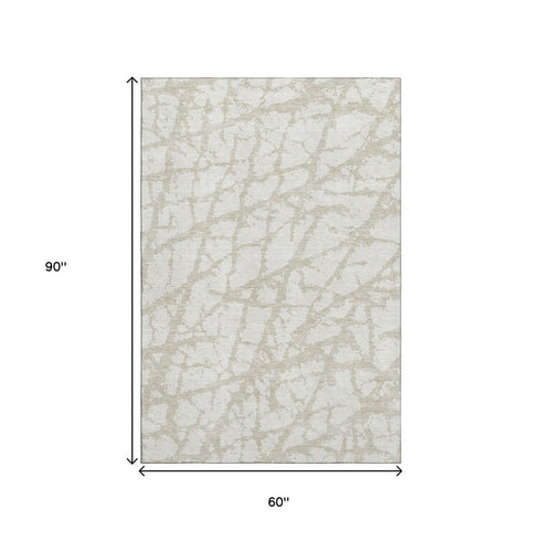 5' X 8' Ivory And Beige Abstract Washable Area Rug With UV Protection