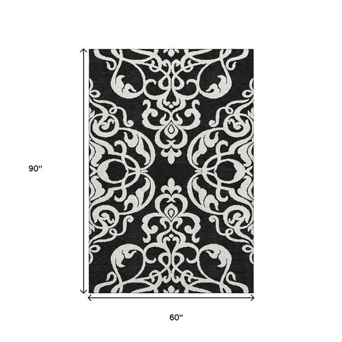 5' X 8' Black And Ivory Damask Washable Area Rug With UV Protection