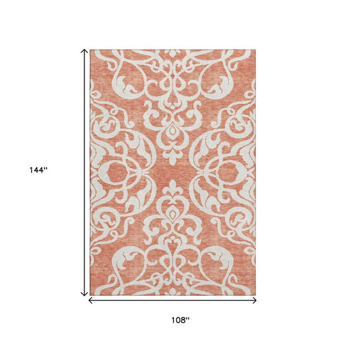 9' X 12' Coral And Ivory Damask Washable Area Rug With UV Protection