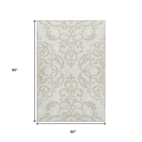 5' X 8' Ivory And Beige Damask Washable Area Rug With UV Protection