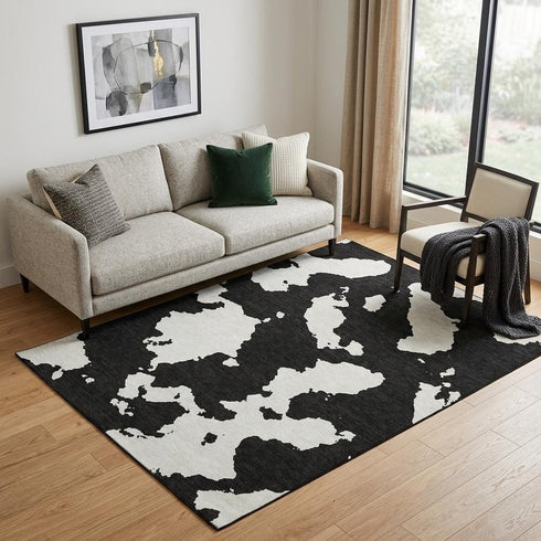 5' X 8' Black And Ivory Abstract Washable Area Rug With UV Protection