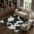 9' X 12' Black And Ivory Abstract Washable Area Rug With UV Protection