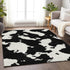 9' X 12' Black And Ivory Abstract Washable Area Rug With UV Protection