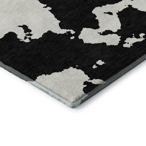9' X 12' Black And Ivory Abstract Washable Area Rug With UV Protection