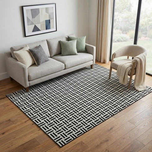 5' X 8' Black And Ivory Geometric Washable Area Rug With UV Protection