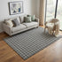 5' X 8' Black And Ivory Geometric Washable Area Rug With UV Protection