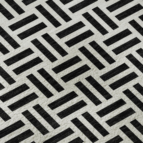 5' X 8' Black And Ivory Geometric Washable Area Rug With UV Protection