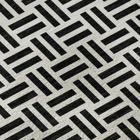 8' X 10' Black And Ivory Geometric Washable Area Rug With UV Protection