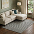9' X 12' Black And Ivory Geometric Washable Area Rug With UV Protection