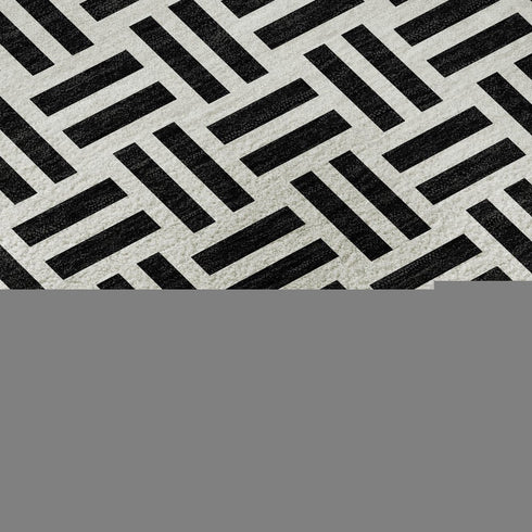 9' X 12' Black And Ivory Geometric Washable Area Rug With UV Protection