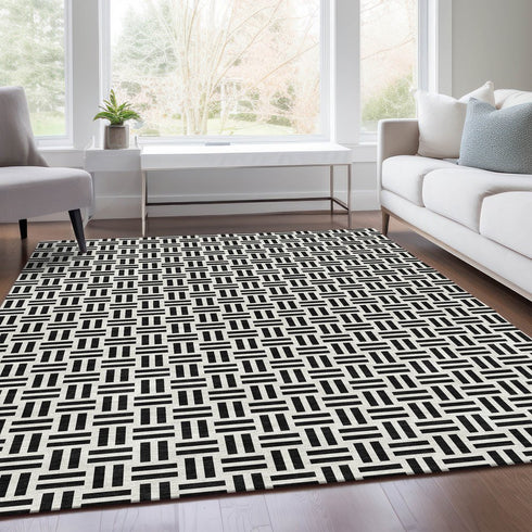 9' X 12' Black And Ivory Geometric Washable Area Rug With UV Protection