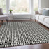 9' X 12' Black And Ivory Geometric Washable Area Rug With UV Protection