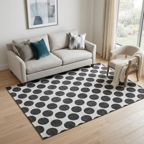 5' X 8' Black And Ivory Polka Dot Washable Area Rug With UV Protection