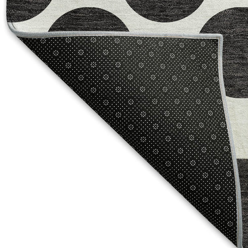 5' X 8' Black And Ivory Polka Dot Washable Area Rug With UV Protection
