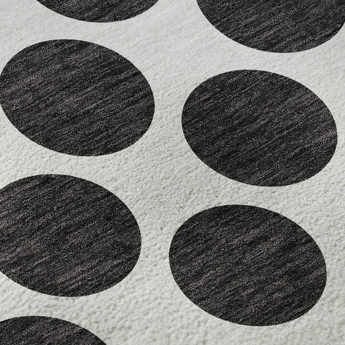 8' X 10' Black And Ivory Polka Dot Washable Area Rug With UV Protection