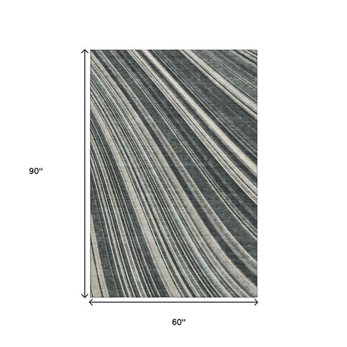 5' X 8' Black Gray And Ivory Striped Washable Area Rug With UV Protection