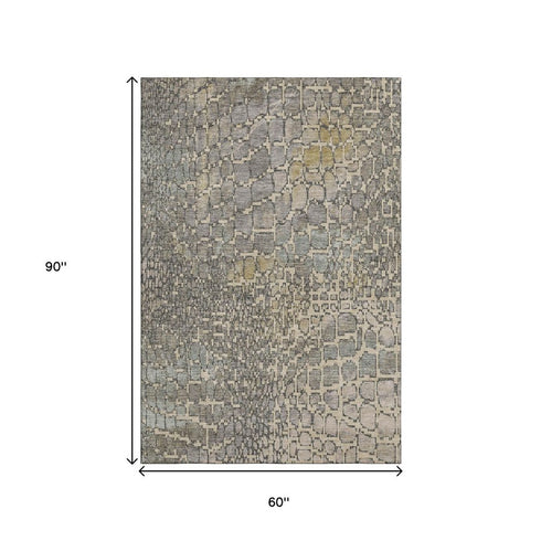 5' X 8' Beige Taupe And Ivory Abstract Geometric Washable Area Rug With UV Protection