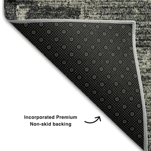 9' X 12' Black And Ivory Abstract Washable Area Rug With UV Protection