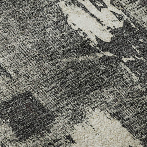 9' X 12' Black And Ivory Abstract Washable Area Rug With UV Protection
