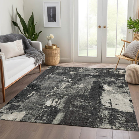 9' X 12' Black And Ivory Abstract Washable Area Rug With UV Protection