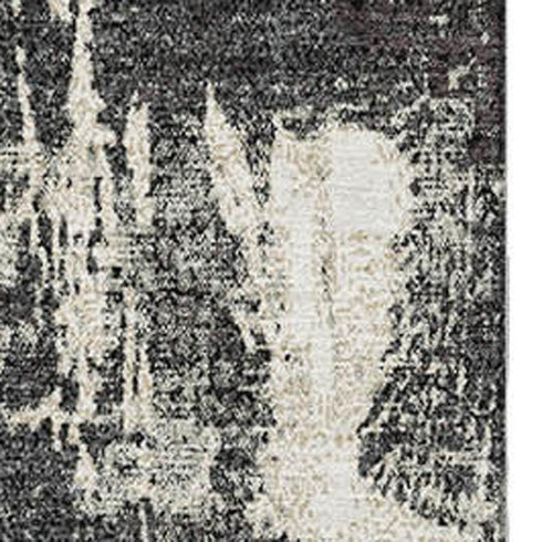 9' X 12' Black And Ivory Abstract Washable Area Rug With UV Protection