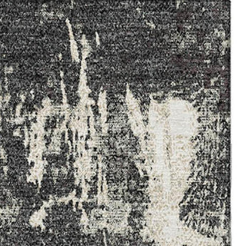 9' X 12' Black And Ivory Abstract Washable Area Rug With UV Protection