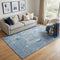 5' X 8' Denim Blue And Ivory Abstract Washable Area Rug With UV Protection