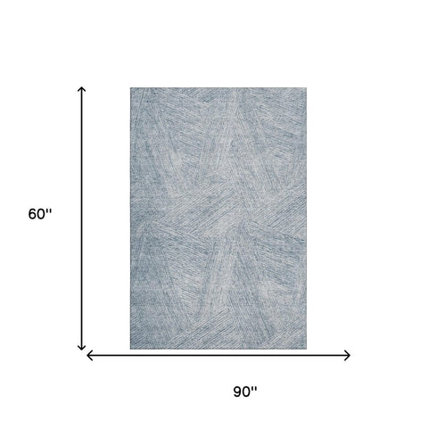 5' X 8' Denim Blue And Ivory Abstract Washable Area Rug With UV Protection