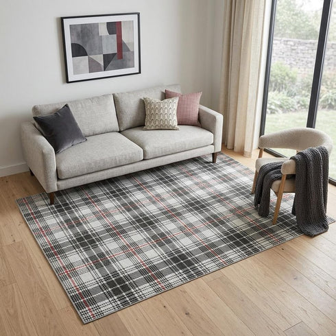 5' X 8' Black Red And Ivory Plaid Washable Area Rug With UV Protection