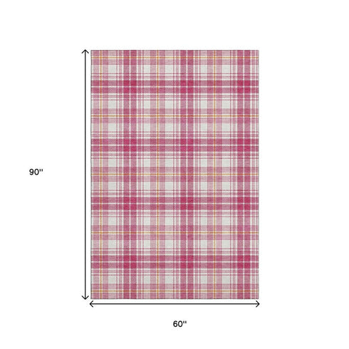 5' X 8' Blush Ivory And Orange Plaid Washable Area Rug With UV Protection