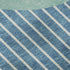 8' X 10' Teal Ivory And Aqua Striped Washable Area Rug With UV Protection