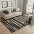 5' X 8' Black Brown And Ivory Striped Washable Area Rug With UV Protection