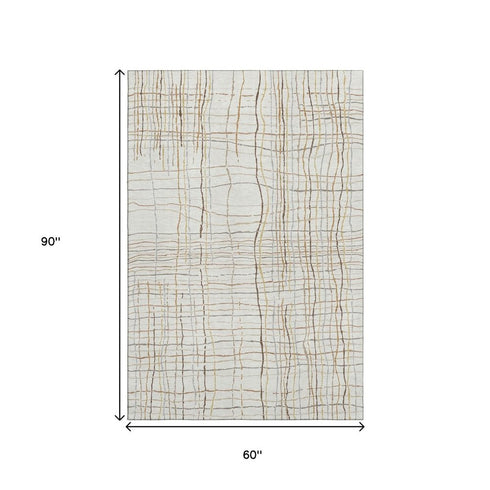 5' X 8' Ivory Gold And Gray Striped Washable Area Rug With UV Protection