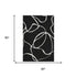 5' X 8' Black And Ivory Abstract Washable Area Rug With UV Protection