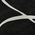 5' X 8' Black And Ivory Abstract Washable Area Rug With UV Protection
