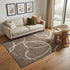 5' X 8' Brown And Beige Abstract Washable Area Rug With UV Protection