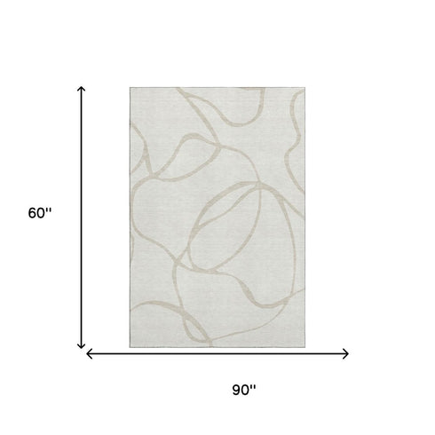 5' X 8' Ivory And Beige Abstract Washable Area Rug With UV Protection