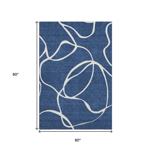 5' X 8' Navy Blue And Ivory Abstract Washable Area Rug With UV Protection