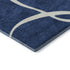 5' X 8' Navy Blue And Ivory Abstract Washable Area Rug With UV Protection