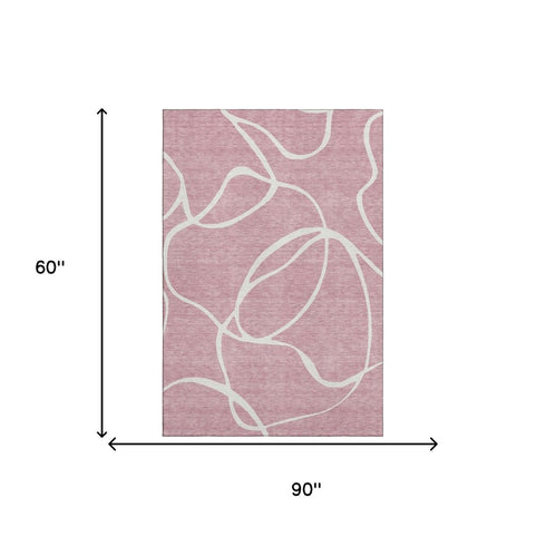5' X 8' Pink And Ivory Abstract Washable Area Rug With UV Protection
