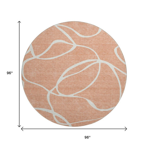 8' Salmon And Ivory Abstract Washable Round Rug With UV Protection
