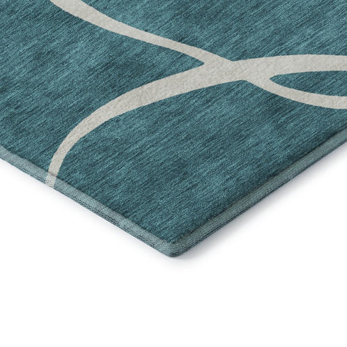 5' X 8' Teal And Ivory Abstract Washable Area Rug With UV Protection
