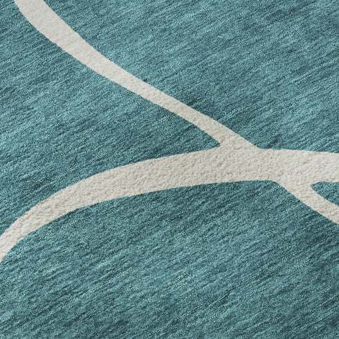 5' X 8' Teal And Ivory Abstract Washable Area Rug With UV Protection