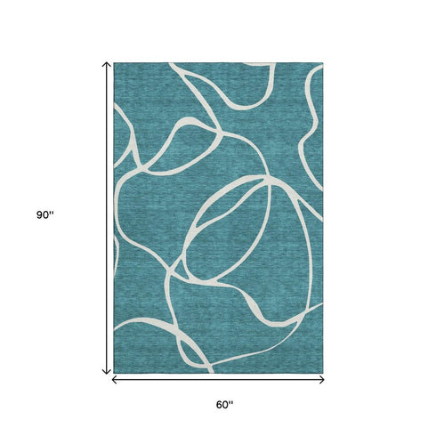 5' X 8' Teal And Ivory Abstract Washable Area Rug With UV Protection