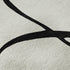 8' White And Black Abstract Washable Round Rug With UV Protection