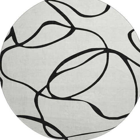 8' White And Black Abstract Washable Round Rug With UV Protection