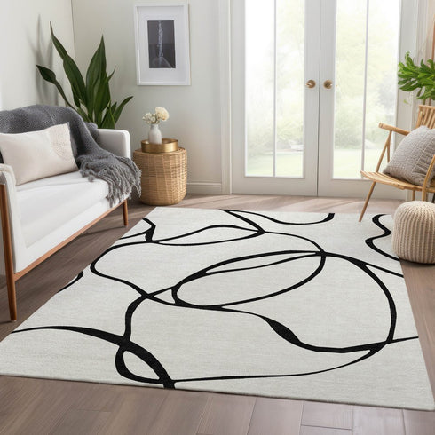 8' X 10' White And Black Abstract Washable Area Rug With UV Protection