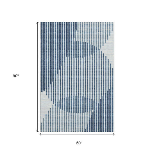 5' X 8' Blue And Ivory Geometric Washable Area Rug With UV Protection