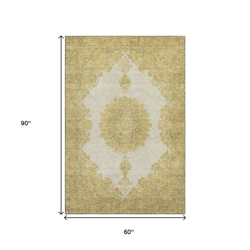 5' X 8' Gold Ivory And Gray Oriental Washable Area Rug With UV Protection