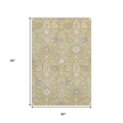 5' X 8' Gold Gray And Ivory Oriental Washable Area Rug With UV Protection